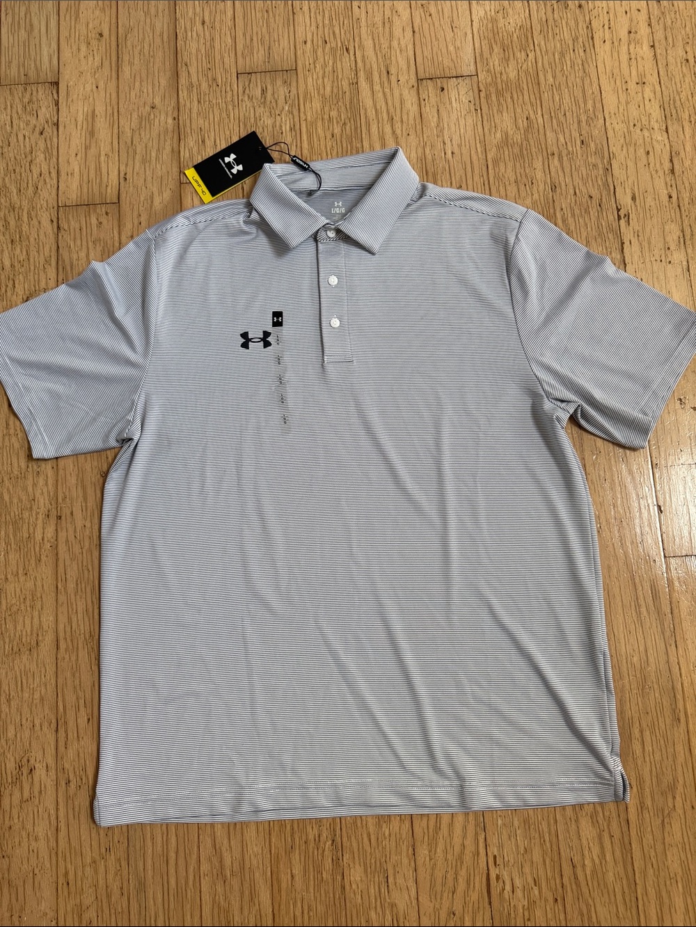UA Men’s Playoff Team Stripe Golf Polo 
UPF 40